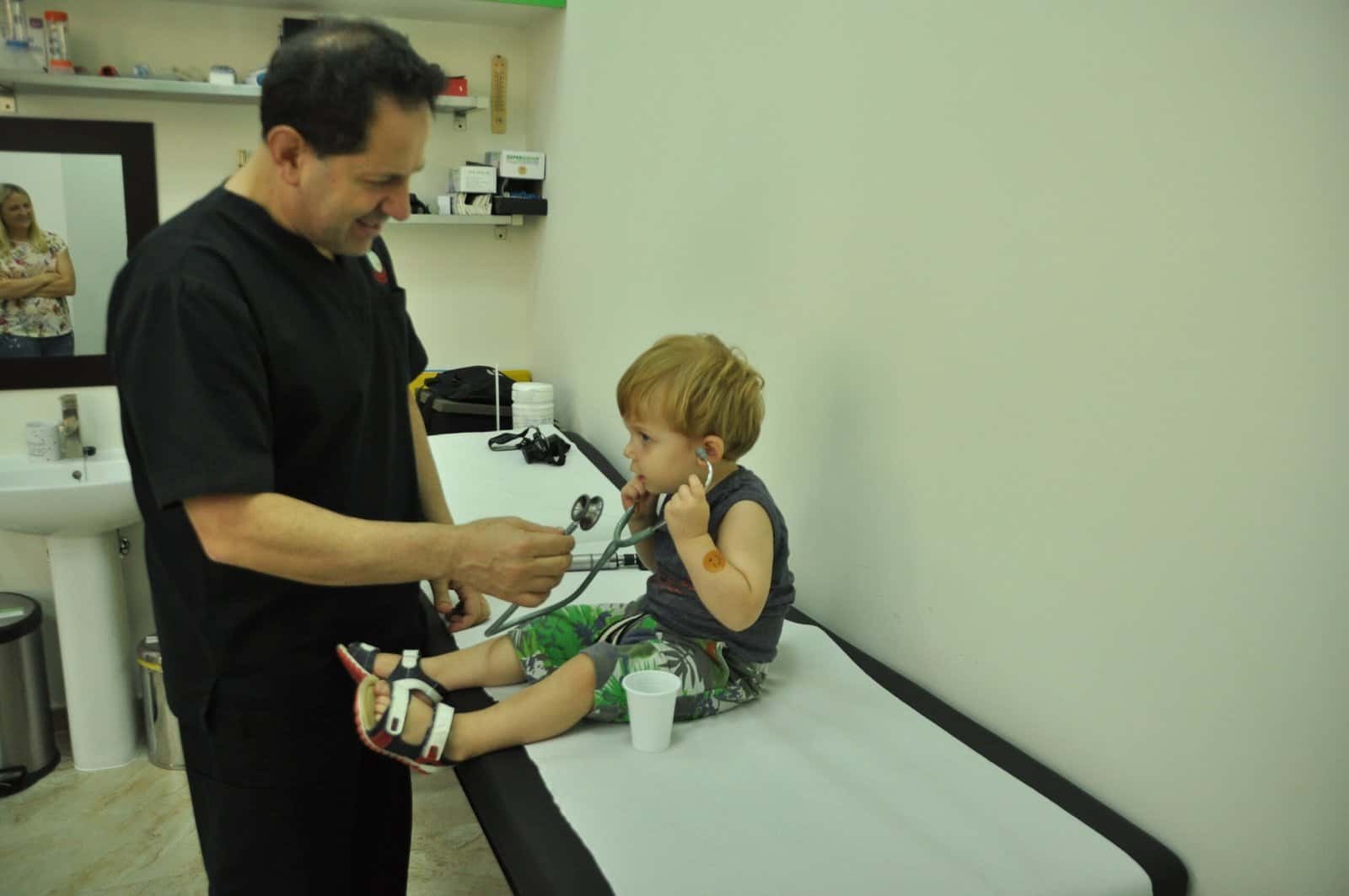 Dr Talal Farha with a child