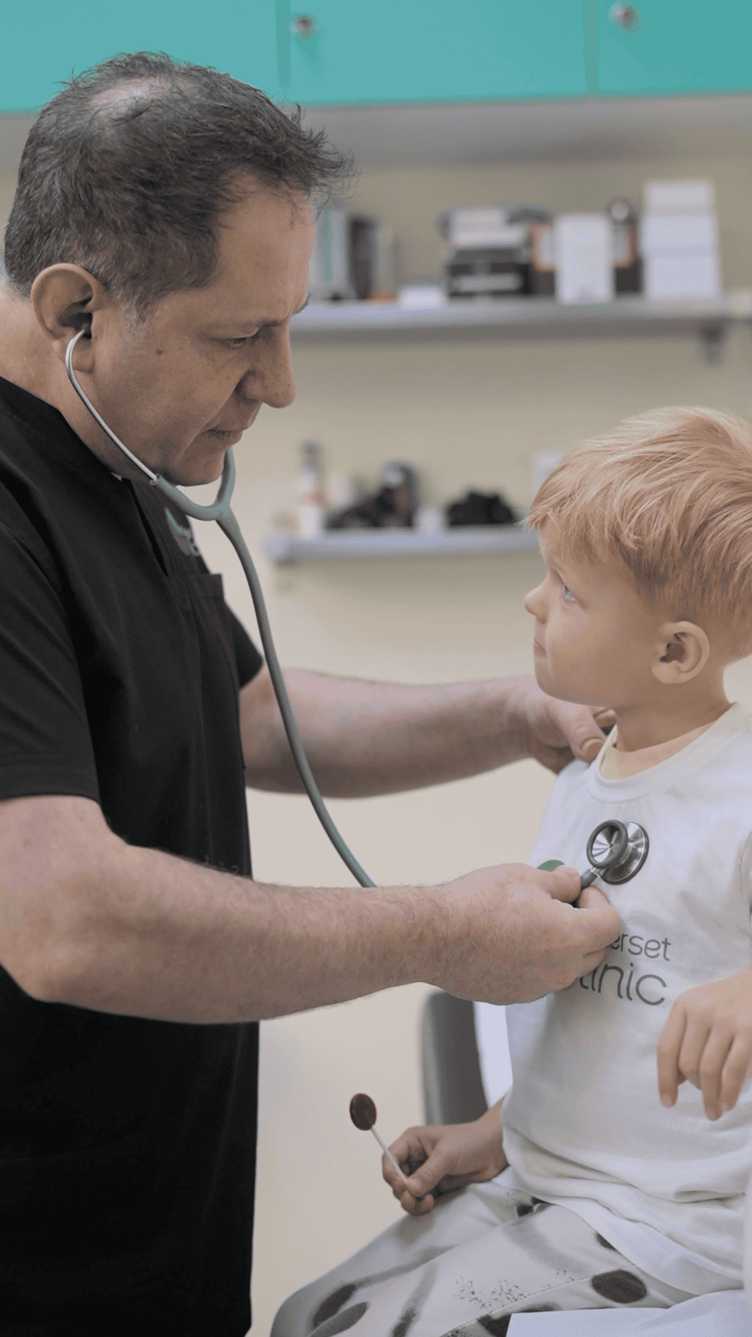 Dr Talal Farha with a Kid