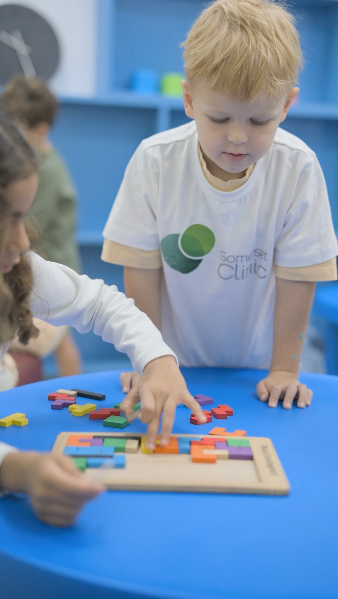 Kids solving puzzles